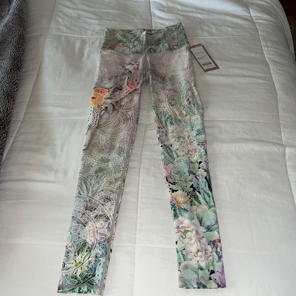 Niyama Sol Pants - Niyama sol “solbox exclusive” rebirth leggings size small NWT
